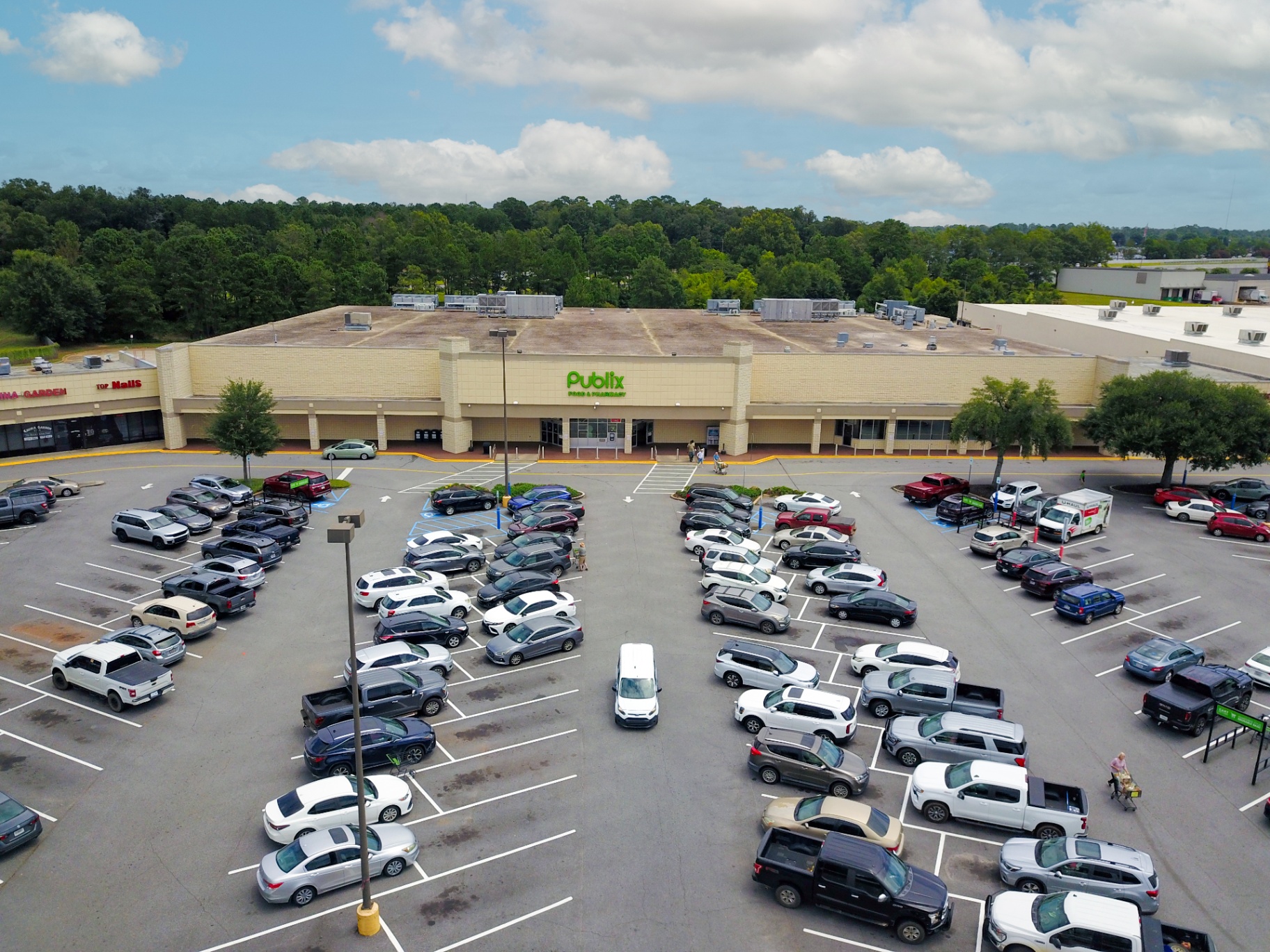 Aerial of the Publix Food & Pharmacy shadow anchor and parking field