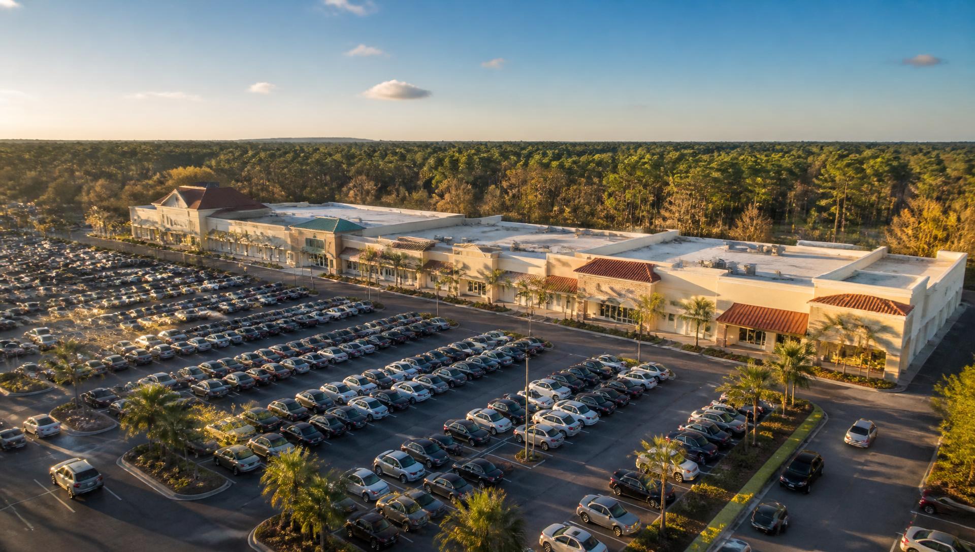 Aerial view of Albany Square shopping center at golden hour